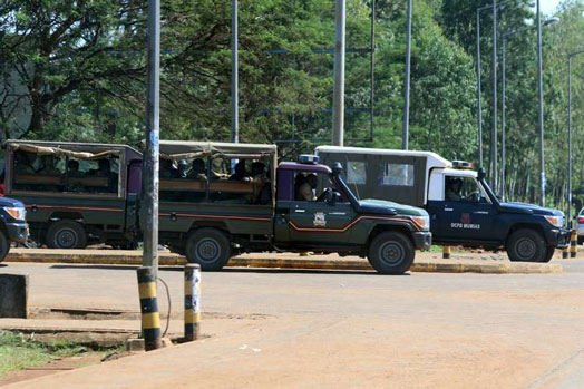 Police officers keep vigil at Mumias town where they have been accused of senselessly beating up residents in an operation to recover stolen firearm. PHOTO | TONNY OMONDI