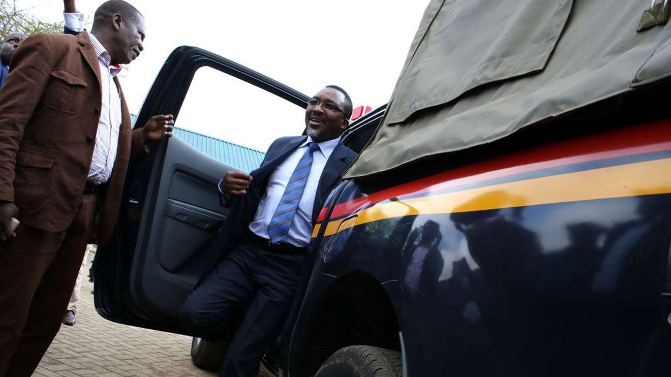 Pastor James Ng'ang'a of Neno Evangelism Centre steps out a police car before appearing in Limuru Law Courts to answer to charges of causing death of Mercy Njeri by dangerous driving, failing to report an accident, giving false information and conspiracy to defeat justice in this photo taken on August 20, 2015. FILE PHOTO | NATION