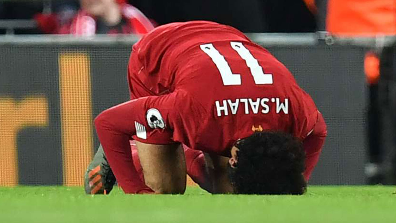 Liverpool's Egyptian striker Mohamed Salah celebrates after scoring a goal against Manchester City in an English Premier League match at Anfield on November 10, 2019. AFP PHOTO